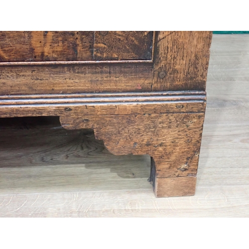 757 - A George III oak enclosed Dresser Base with feather banded inlay fitted three frieze drawers above a... 