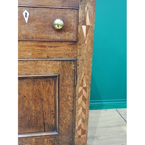 757 - A George III oak enclosed Dresser Base with feather banded inlay fitted three frieze drawers above a... 