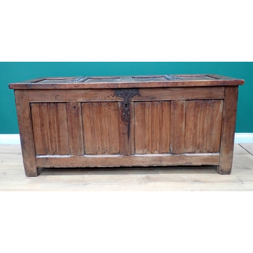 765 - A Norman or French joined oak Coffer utilising 16th Century and later elements, with strap hinged su... 