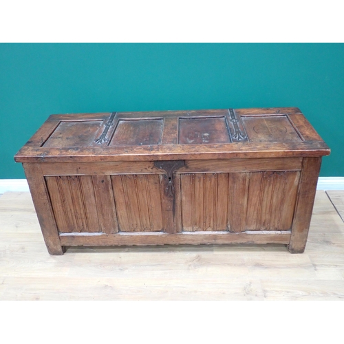 765 - A Norman or French joined oak Coffer utilising 16th Century and later elements, with strap hinged su... 