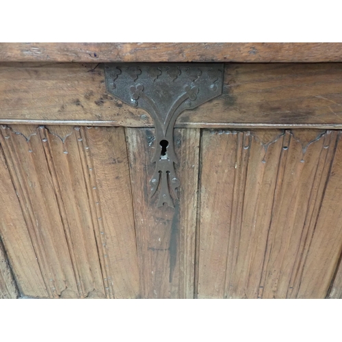 765 - A Norman or French joined oak Coffer utilising 16th Century and later elements, with strap hinged su... 