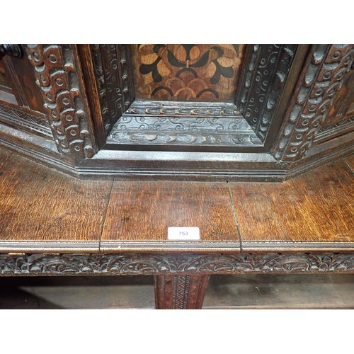 753 - A Charles I and later oak Court Cupboard, the upper section fitted pair of cupboard doors, the inlai... 