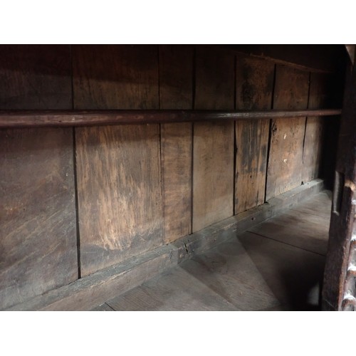 753 - A Charles I and later oak Court Cupboard, the upper section fitted pair of cupboard doors, the inlai... 