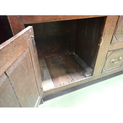 745 - A late 17th Century oak Dresser Base fitted five drawers and pair of doors with applied mouldings, 6... 