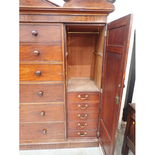 53 - A 19th Century mahogany Gentleman's Secretaire Cabinet having arched pediment, with a hinged pair of... 