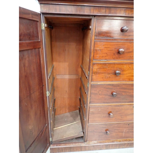 53 - A 19th Century mahogany Gentleman's Secretaire Cabinet having arched pediment, with a hinged pair of... 