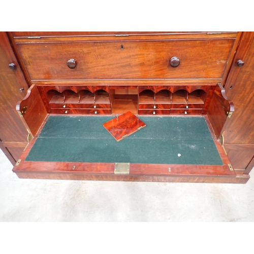 53 - A 19th Century mahogany Gentleman's Secretaire Cabinet having arched pediment, with a hinged pair of... 