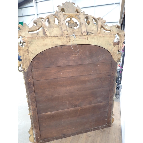 64 - A late 18th Century/early 19th Century Irish gilt Overmantel Mirror with elaborate pierced and scrol... 