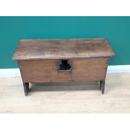 85 - A 17th Century oak plank Coffer with hinged top, moulded detail on shaped side supports, 3ft 1in (la... 