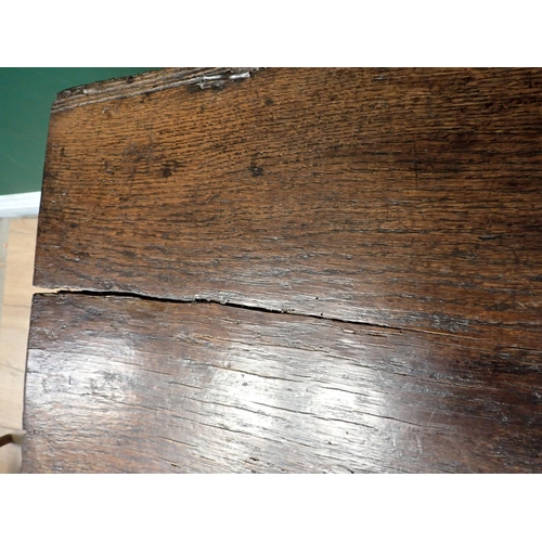 85 - A 17th Century oak plank Coffer with hinged top, moulded detail on shaped side supports, 3ft 1in (la... 