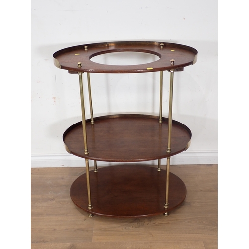 308 - A 19th Century oak or camphor oval Campaign Washstand with brass rim and supports, collapsible for t... 