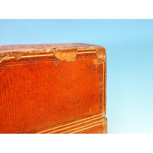 310 - A 19th Century tooled and embossed leather Knife Box with hinged sloping front enclosing a lined and... 