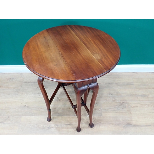 404 - A Georgian style mahogany oval Sutherland Table with moulded top mounted upon fine cabriole supports... 