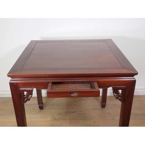 442 - A square Chinese occasional Table on shaped supports and rail, 2ft 8in square