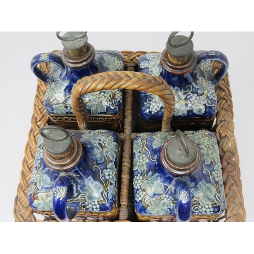 340 - A set of four Doulton Lambeth stoneware Spirit Flasks and Stoppers of square section, G for Gin, B f... 