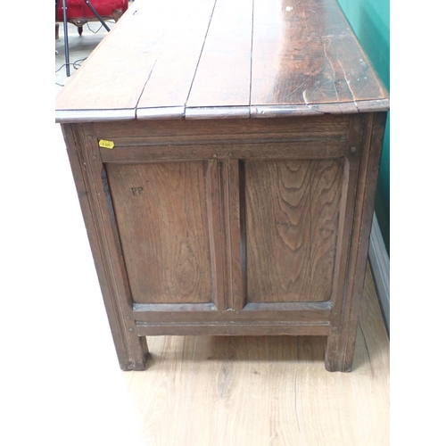 355 - An antique oak Coffer with plank lid above plain three panel front, 4ft 1in