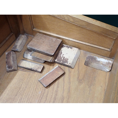 375 - A pair of Victorian panelled oak Desks, the hinged sloping top with inset writing surfaces decorated... 