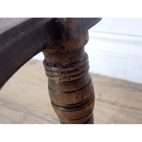 398 - A Victorian walnut Centre Table with shaped top, cross stretcher, on ring turned supports A/F 3ft 3