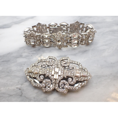 112 - An Art Deco Style Diamante Double Clip and a Diamante Bracelet.