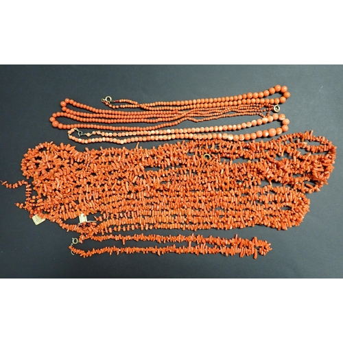 113 - A very long staghorn Coral Necklace, a triple row Coral Necklace, a short Coral Necklace and three C... 