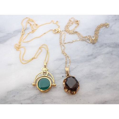 116 - A 9ct gold swivel Pendant Fob set prase and onyx on fine 9ct gold chain and a Smoky Quartz Pendant c... 