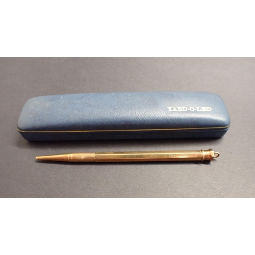 129 - A 9ct gold cased retractable Pencil, marked Baker's Perm-Point, approx 15.30gms all in