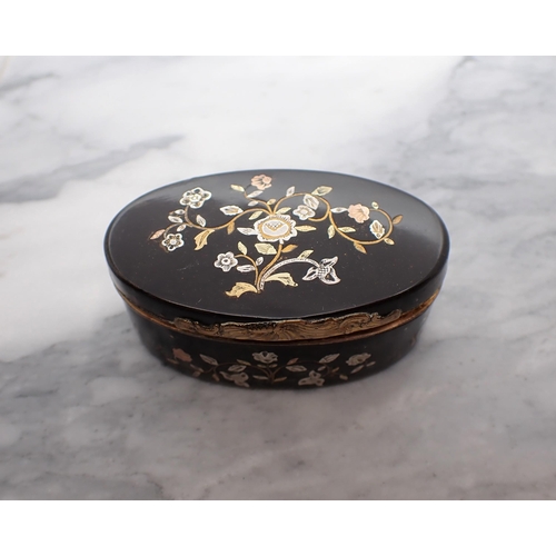 130 - A 19th Century oval tortoiseshell Snuff Box with silver and gold piqué decoration and yellow metal m... 