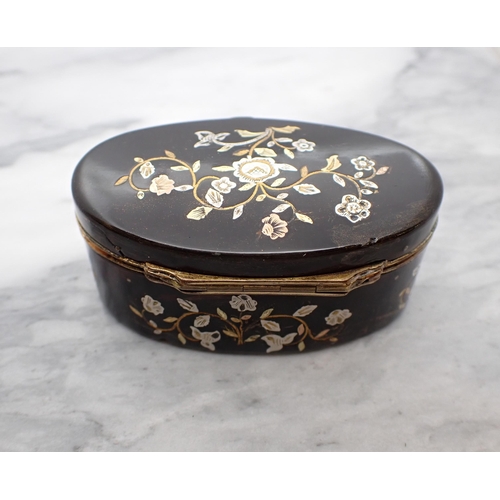 130 - A 19th Century oval tortoiseshell Snuff Box with silver and gold piqué decoration and yellow metal m... 