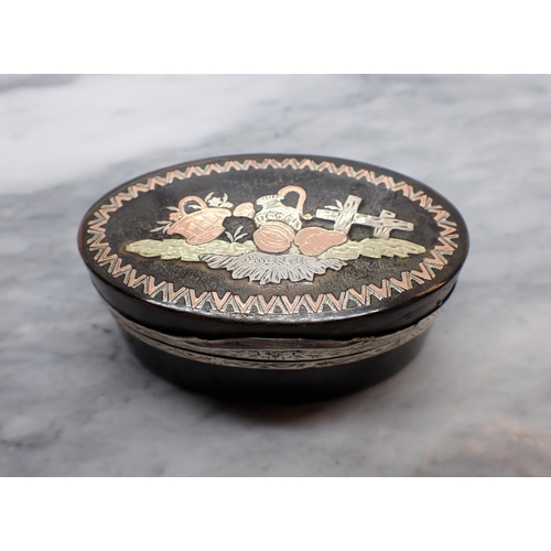 132 - A 19th Century oval tortoiseshell Snuff Box the hinged lid inlaid piqué vignette with white metal mo... 