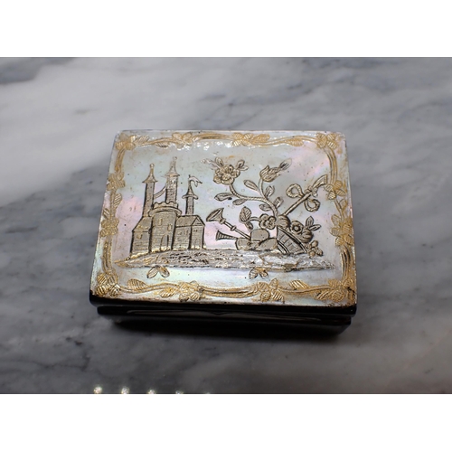 134 - A Continental rectangular Snuff Box the hinged lid with mother of pearl inlaid castle and flowers wi... 