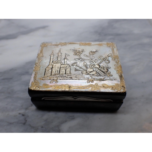 134 - A Continental rectangular Snuff Box the hinged lid with mother of pearl inlaid castle and flowers wi... 