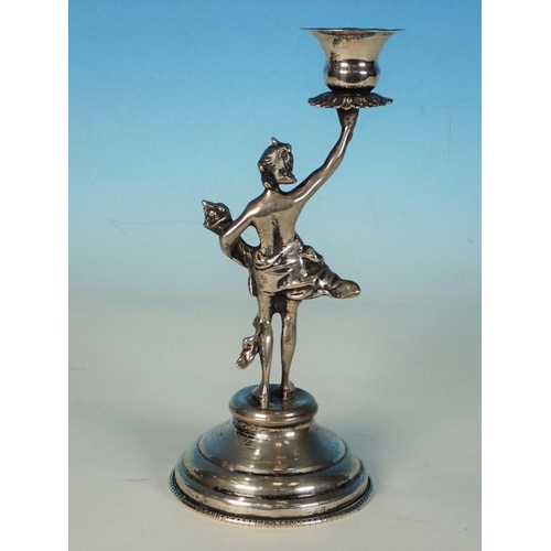 140 - A Continental white metal Figural Candlestick with stepped circular base, 6 1/2 in H