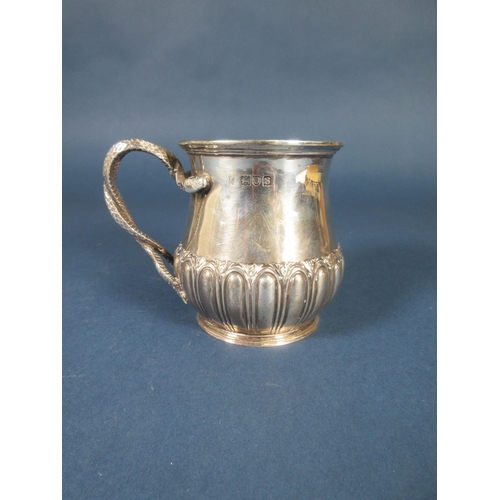 142 - A George V silver Christening Mug with gadroon embossing, serpent handle engraved initials, London 1... 