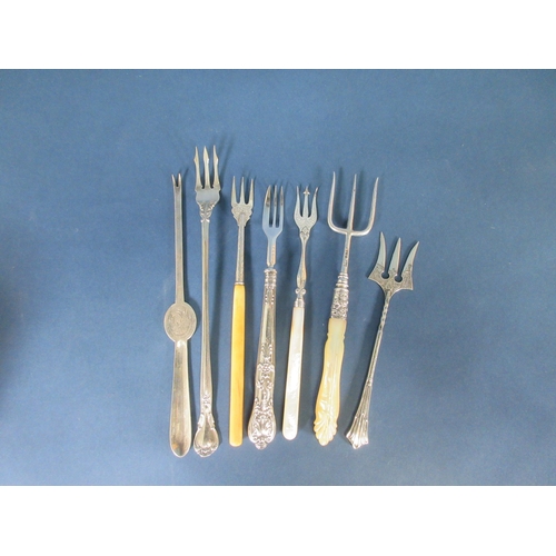 158 - Six various silver Pickle and Bread Forks and a silver Lobster Pick