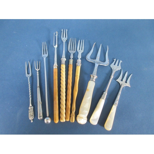 160 - Ten various silver Pickle and Bread Forks