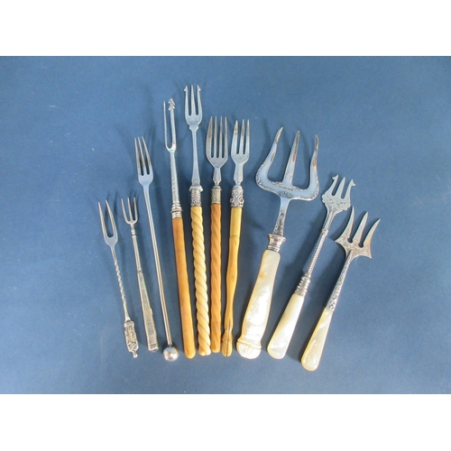 160 - Ten various silver Pickle and Bread Forks