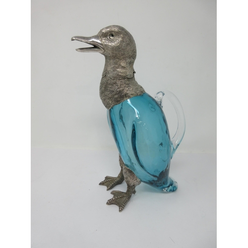 210 - A blue glass Decanter with plated mounts in the form of a duck with hinged head and pouring through ... 