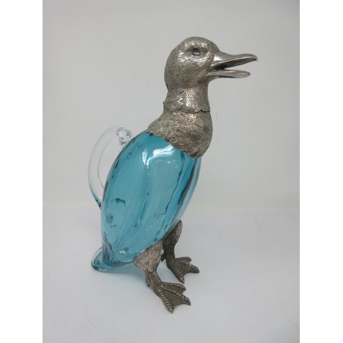 210 - A blue glass Decanter with plated mounts in the form of a duck with hinged head and pouring through ... 