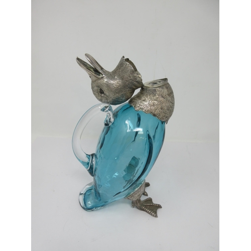 210 - A blue glass Decanter with plated mounts in the form of a duck with hinged head and pouring through ... 