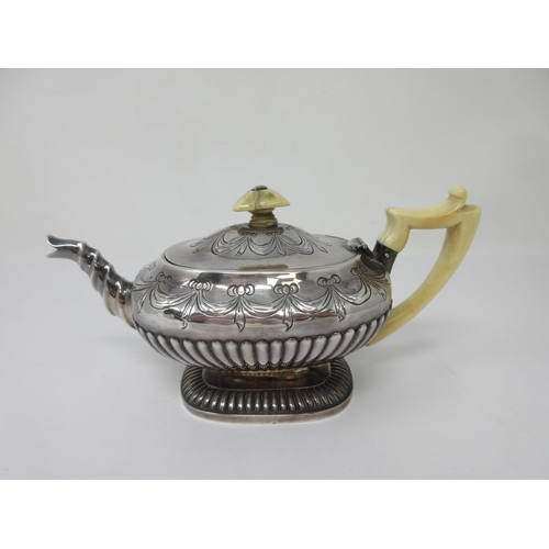 214 - ******WITHDRAWN******


A George III Bachelor’s Teapot of boat shape engraved swags, No 436, London ... 