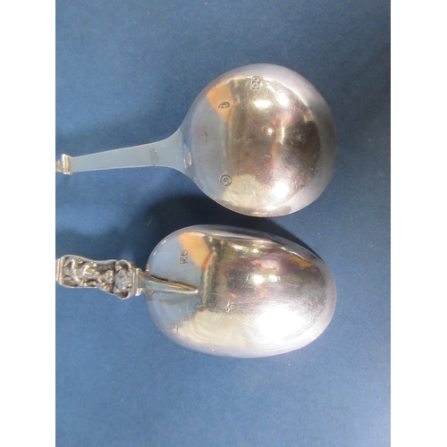 224 - Two Continental silver Spoons with figural finials and spiral stems