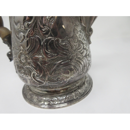 230 - A George II silver Coffee Pot with floral and scroll embossing, pear wood handle, Newcastle 1750, 91... 