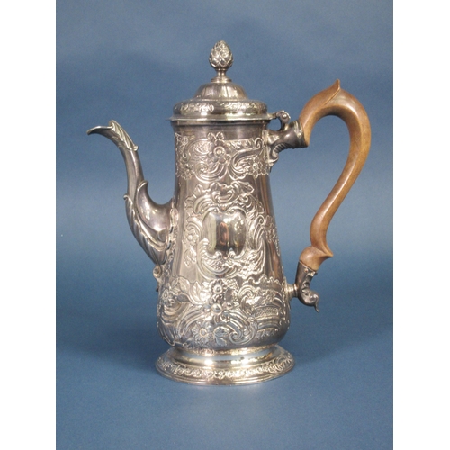 230 - A George II silver Coffee Pot with floral and scroll embossing, pear wood handle, Newcastle 1750, 91... 