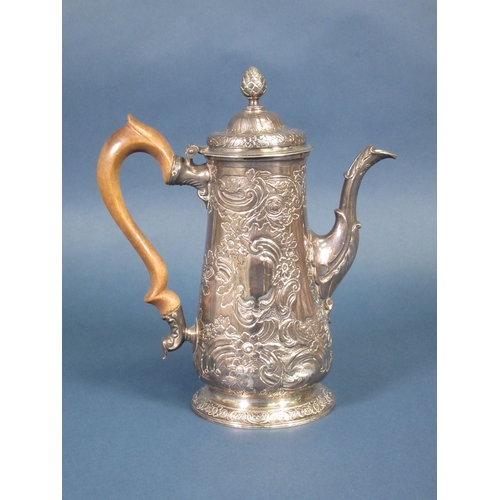 230 - A George II silver Coffee Pot with floral and scroll embossing, pear wood handle, Newcastle 1750, 91... 