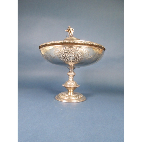 234 - A Victorian silver Pedestal Bowl and Cover, the lid with figure and anchor finial, four embossed ova... 