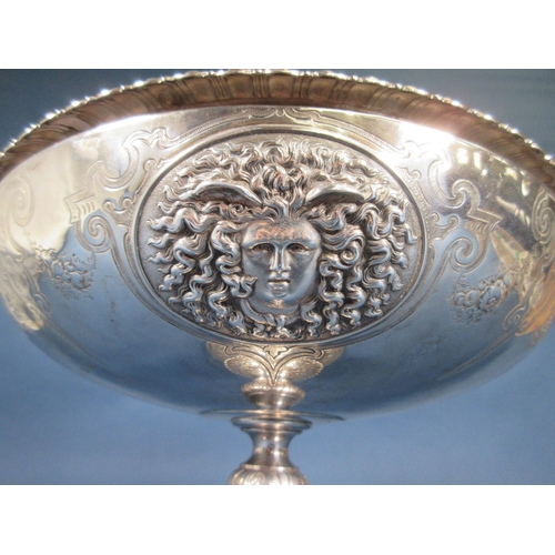 234 - A Victorian silver Pedestal Bowl and Cover, the lid with figure and anchor finial, four embossed ova... 