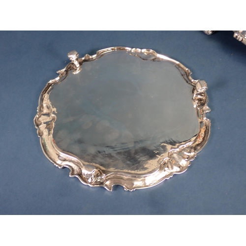 246 - A Victorian silver Salver and matching Waiter of shaped circular form having scallop and scroll bord... 