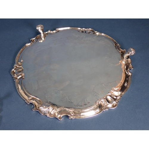 246 - A Victorian silver Salver and matching Waiter of shaped circular form having scallop and scroll bord... 