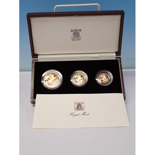 364 - A Royal Mint 1983 Gold Proof Collection, consisting of a Two Pound, Sovereign and Half Sovereign, in... 