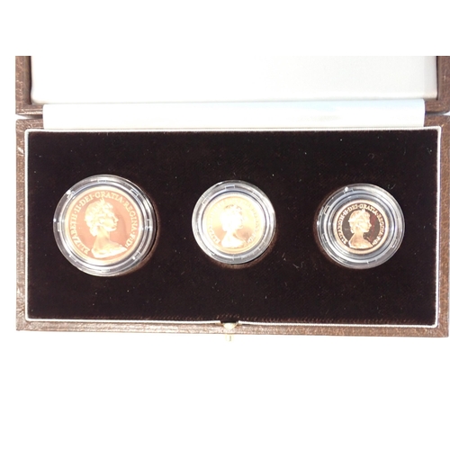 364 - A Royal Mint 1983 Gold Proof Collection, consisting of a Two Pound, Sovereign and Half Sovereign, in... 